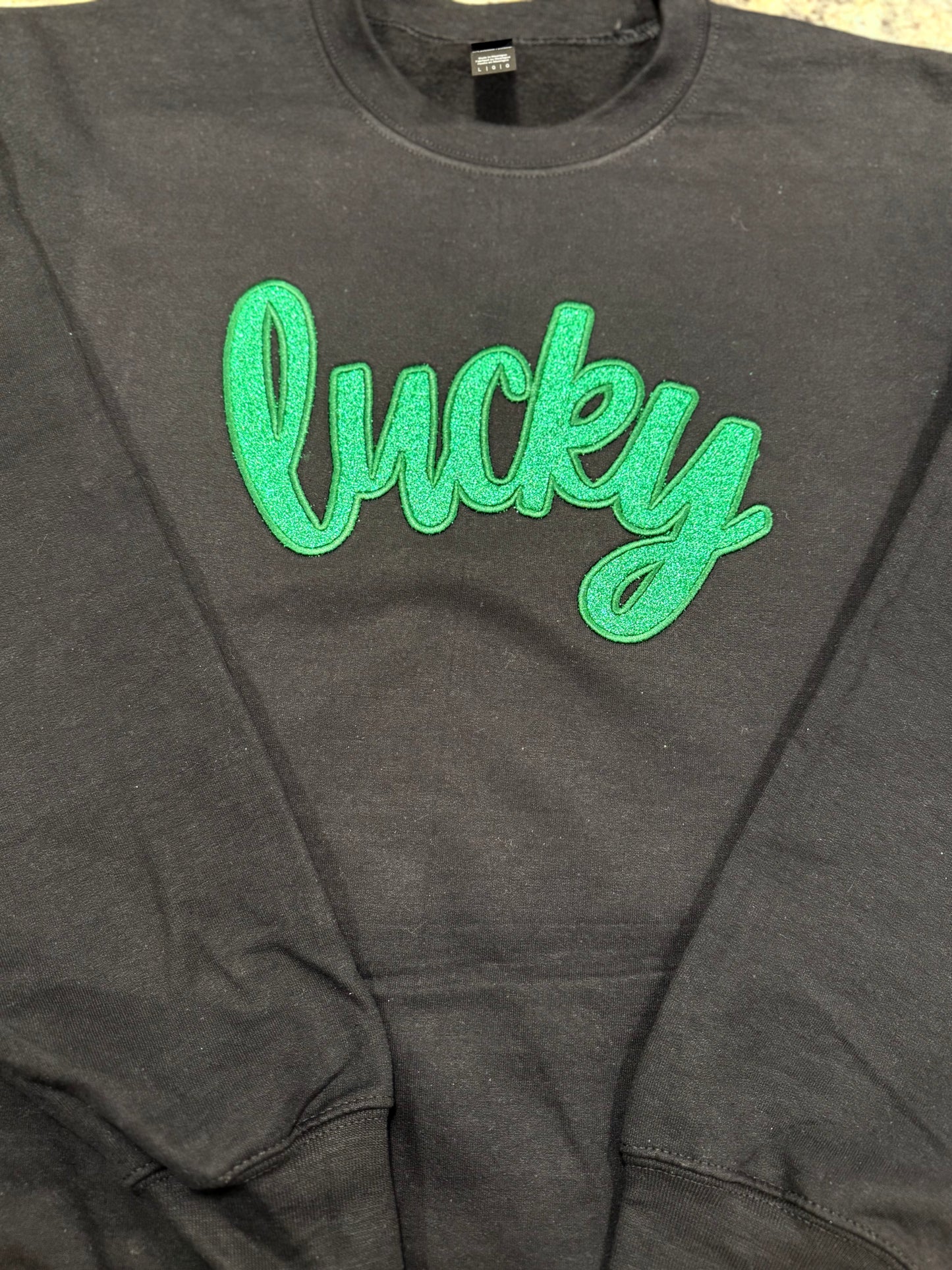 Embroidered “Lucky” Green Glitter Satin Stitch Black Sweatshirt St. Pats